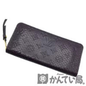 Louis Vuitton Exotic Python Jumping Wallet Round Long